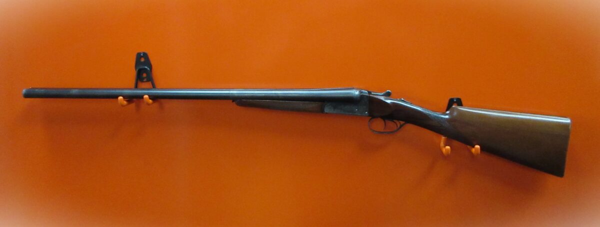 EIBAR 12 GAUGE SIDE BY SIDE SHOTGUN.